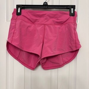Lulu lemon sonic pink low rise speed ups Size 4, 2.5 inch athletic Shorts